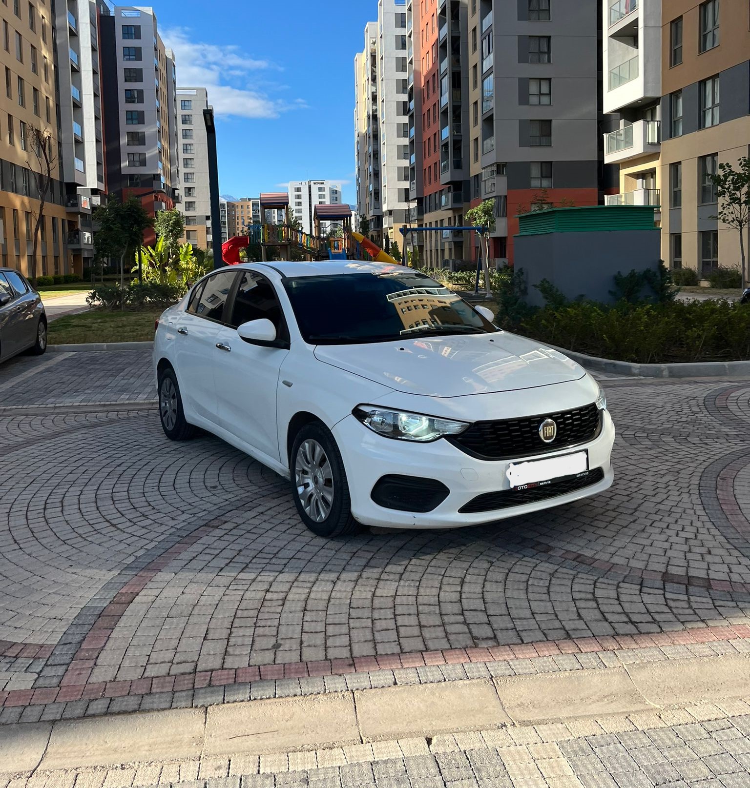 a Sedan in a parking lot